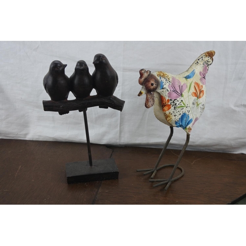 73 - A hand painted metal chicken and another of birds resting on a branch.