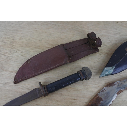 93 - Two dagger in leather sheaths.