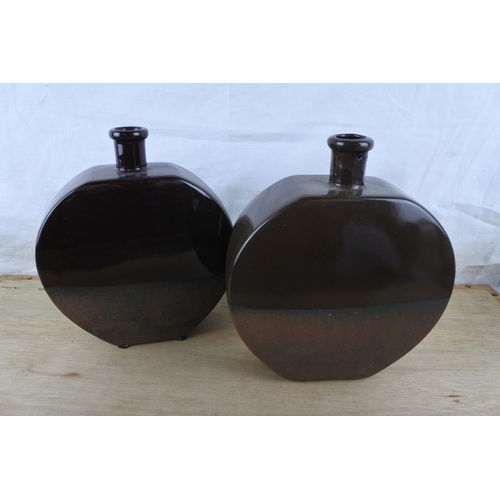 95 - Two studio pottery Troika ware vessels.