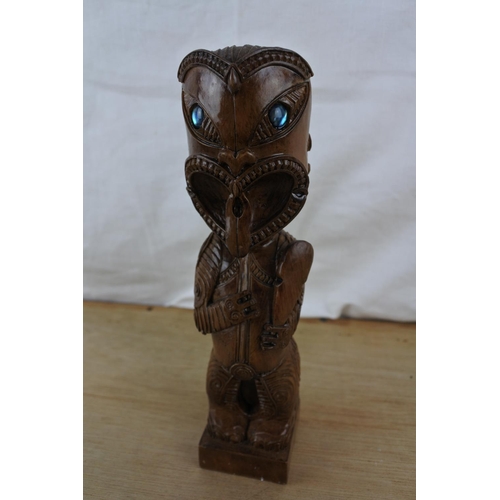 97 - A wooden carved figurine.