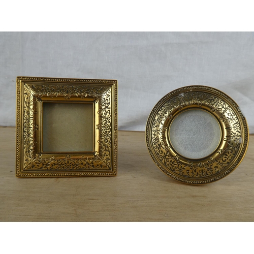 520 - 2 decorative brass framed photo frames.