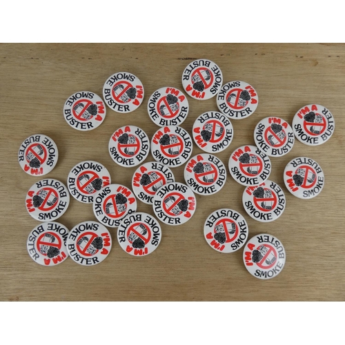 523 - A large assortment of vintage Smoke Busters pin badges.