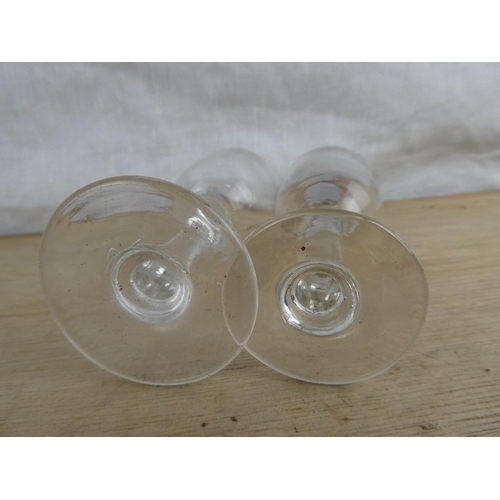 532 - 2 antique/ Victorian glasses with gadget cut bases.