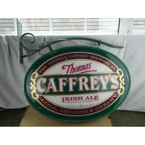 543 - A large double sided pub advertising sign, 'Thomas Caffrey's Irish Ale'.