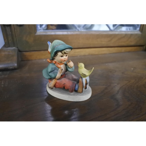 78 - A Goebel Hummel figurine, 'Singing Lessons'