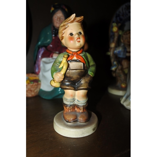 80 - A Goebel Hummel figurine, 'Trumpet Boy'.