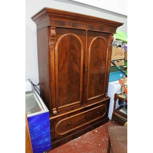 1007 - A stunning antique/ Victorian double wardrobe with drawer to base.