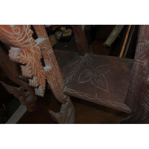 620 - A stunning pair of unusual carved tables, with African Animals carved to tops.