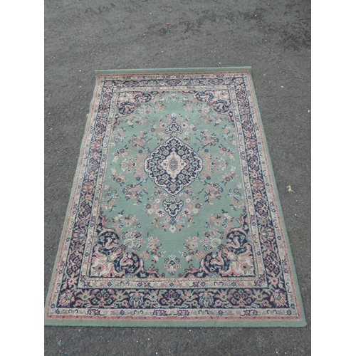 567 - A decorative rug, measuring 120x170cm.