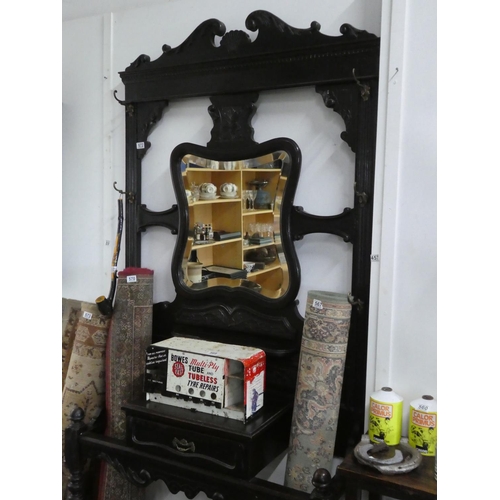 572 - A stunning antique freestanding hall stand with bevelled glass mirror.