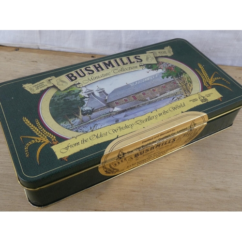 589 - A Bushmills Whiskey collectors tin & booklet.