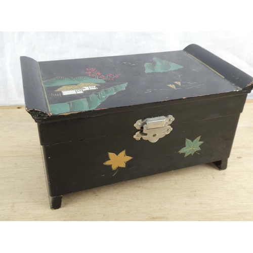 592 - A vintage hand painted musical jewellery box.