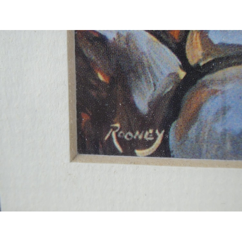 601 - A framed Rooney print.