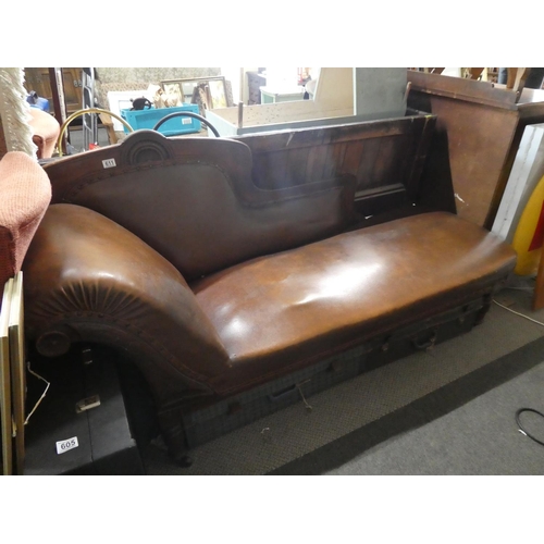 611 - An antique leather Chaise Lounge.