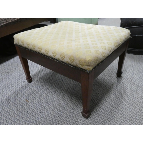 614 - An antique footstool.