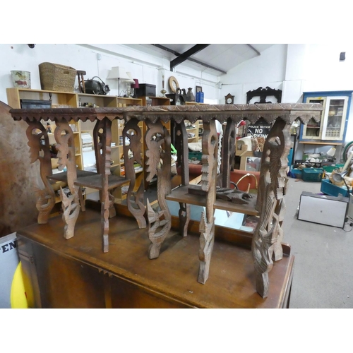 620 - A stunning pair of unusual carved tables, with African Animals carved to tops.