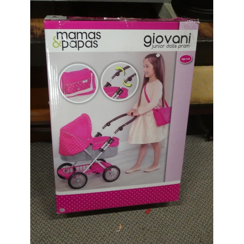 623 - A boxed Mamas & Papas dolls pram.