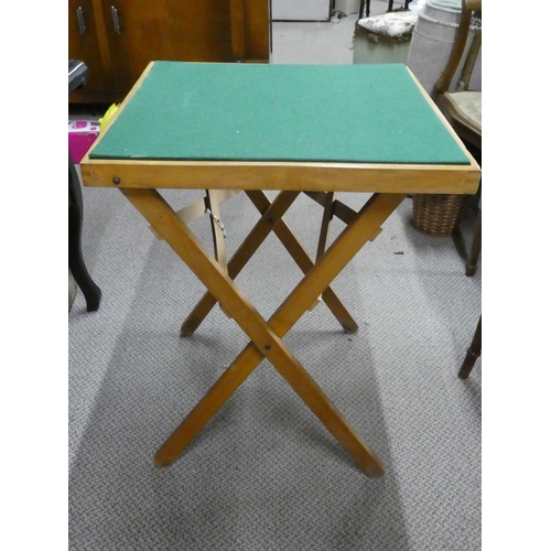 626 - A folding card table.