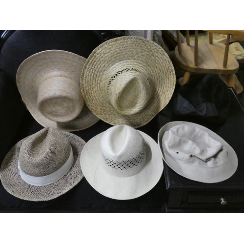 628 - An assortment of various hats.