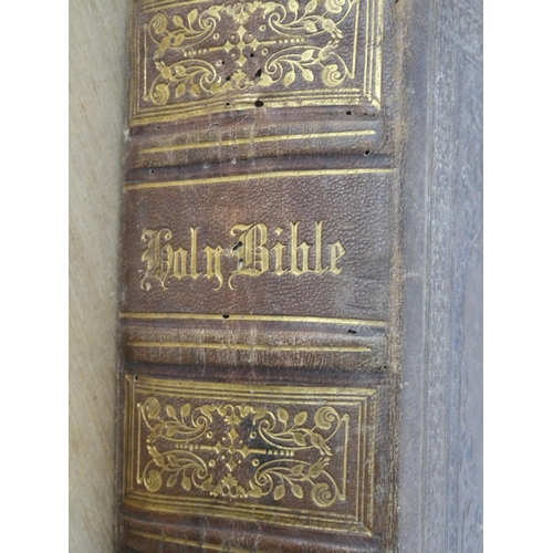 631 - A large antique Holy Bible.