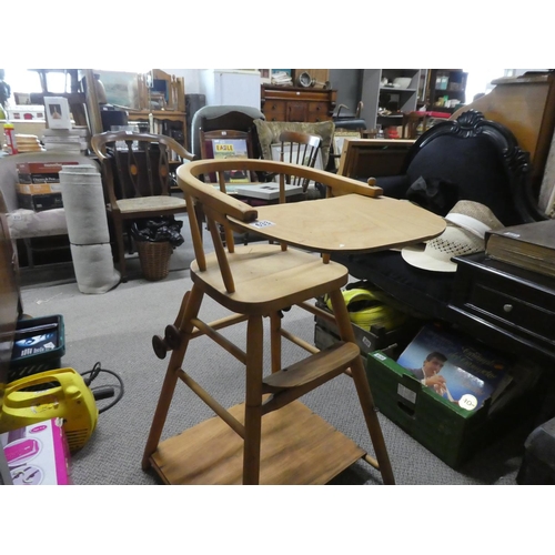 633 - A vintage wooden highchair.