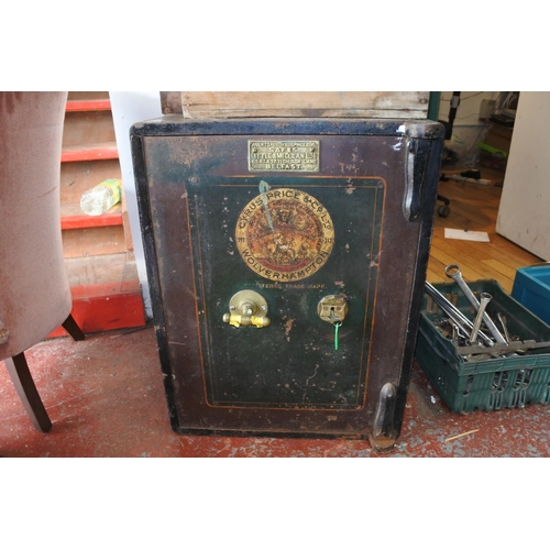 1001 - An antique Cyrus Price & Co safe with key. (Measuring 67x51x55cm).