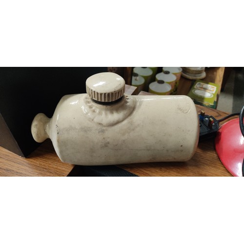 578 - An antique stoneware hot water bottle.
