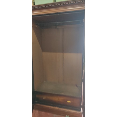 995 - A stunning antique triple wardrobe with mirror door, in need of some restoration.