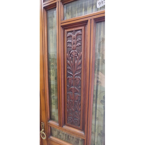 995 - A stunning antique triple wardrobe with mirror door, in need of some restoration.