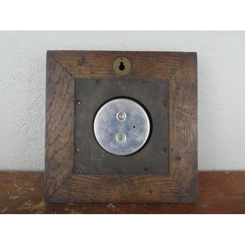 102 - A vintage oak cased Smiths barometer.