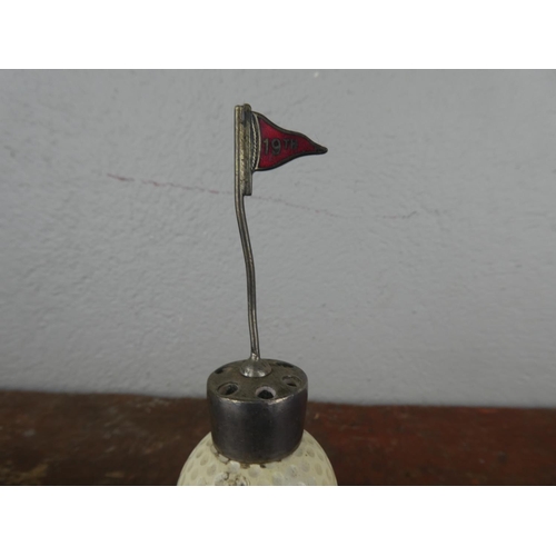 110 - An unusual mounted Penfold golf ball 19th hole cocktail stick holder.