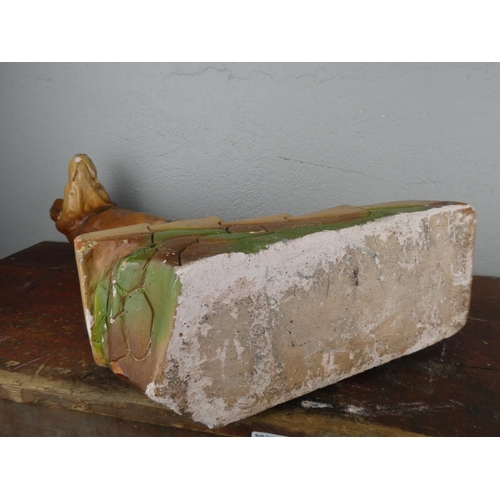 115 - A large chalkware figurine of an Alsatian dog, measuring 45cm tall.