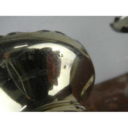 117 - A pair of silver plated bud vases, measuring 20cm tall.