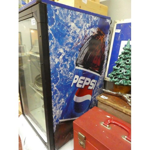 122 - A commercial Pepsi fridge.
