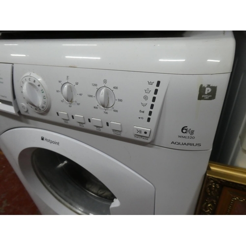 126 - A Hotpoint Aquarius washing machine.