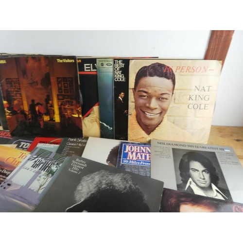 132 - A collection of various records/albums to ABBA, Neil Diamond, Carpenters and more.