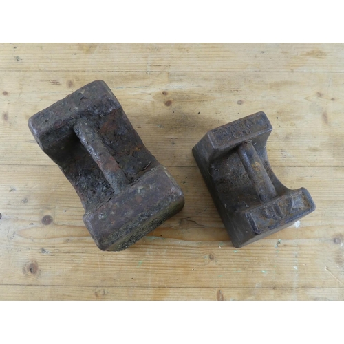 136 - A 7lb weight and another.