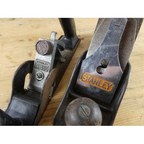 137 - Two Stanley wood planes and saw.