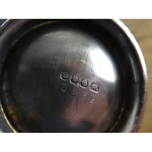 154 - A three piece silver plated tea service.