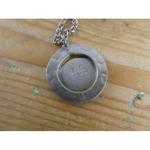 173 - A pewter 'Denmark' pendant and chain.