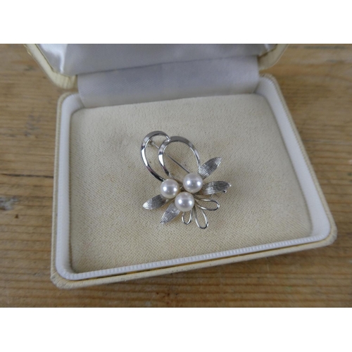 176 - A boxed pearl brooch from Mikimoto Pearl Island.