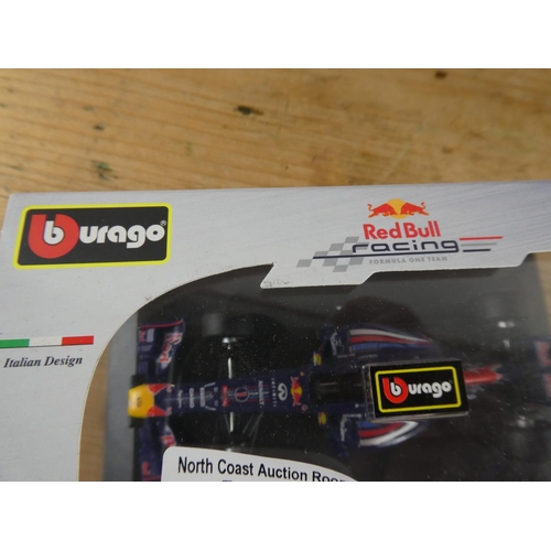 179 - A boxed Burago 'Red Bull Racing Team - Sebastain Vettel' racing car.