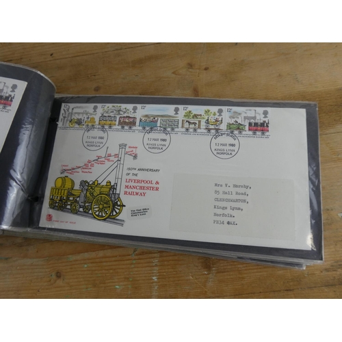 180 - A folder containing a large collection of first day covers.