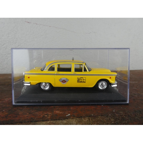 64 - A cased collectors car, 'Checker - New York - 1980'.