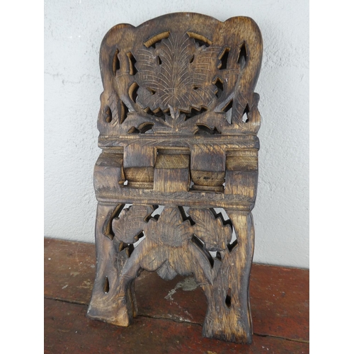 68 - A folding book rest.