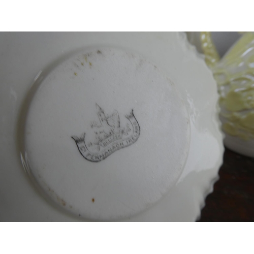 73 - A large collection of Belleek pottery.