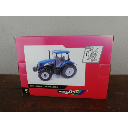 74 - A boxed Britains New Holland T6070 tractor.