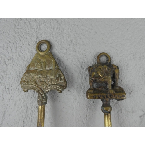 76 - Two vintage brass toasting forks.