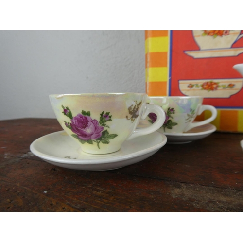 84 - A vintage boxed child's tea set.