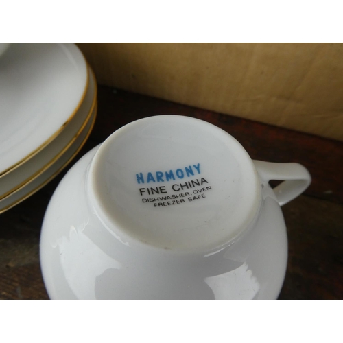 85 - A boxed Harmony bone china tea set.